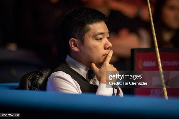 Ding Junhui of China reacts during his second round match against Chris Wakelin of England on day three of the 2017 Scottish Open at Emirates Arena...