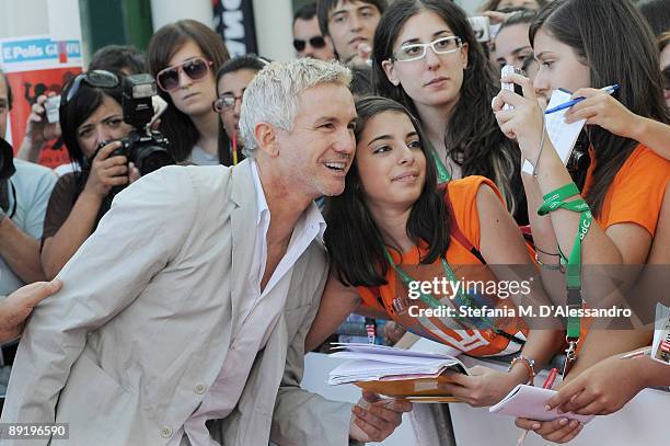 Director Baz Luhrmann poses with fans during the 2009 Giffoni Experience on July 18, 2009 in Salerno, Italy.