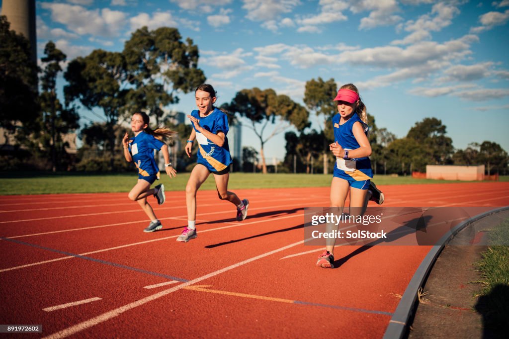 Running Rivals Girls Girls Running Race High-Res Stock Photo - Getty Images