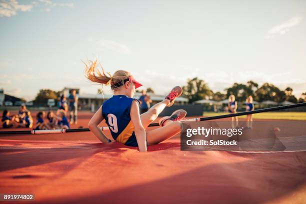 unsuccesful high jump attempt - young athlete stock pictures, royalty-free photos & images