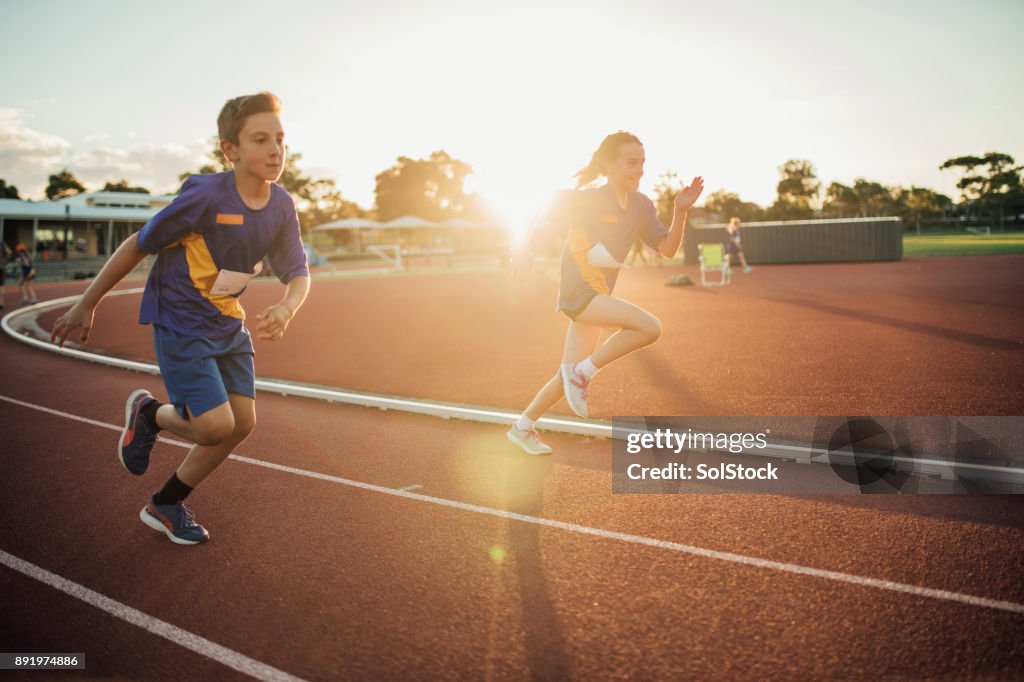Running Rivals Girls Girls Running Race High-Res Stock Photo - Getty Images