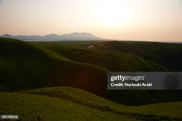 mountain silhouette in morning glow, aso - aso kumamoto stock pictures, royalty-free photos & images