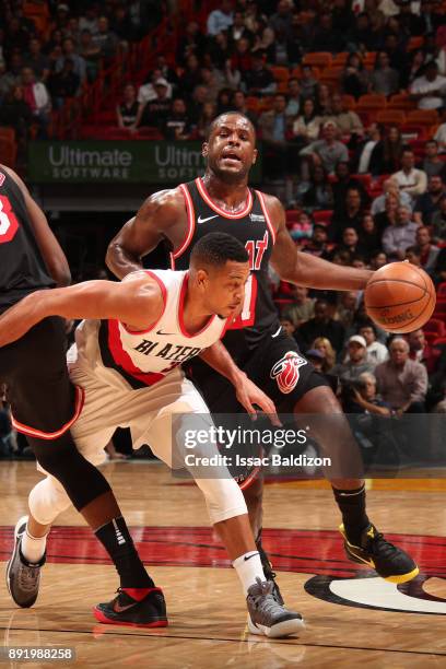 Dion Waiters of the Miami Heat handles the ball against the Portland Trail Blazers on December 13, 2017 at American Airlines Arena in Miami, Florida....