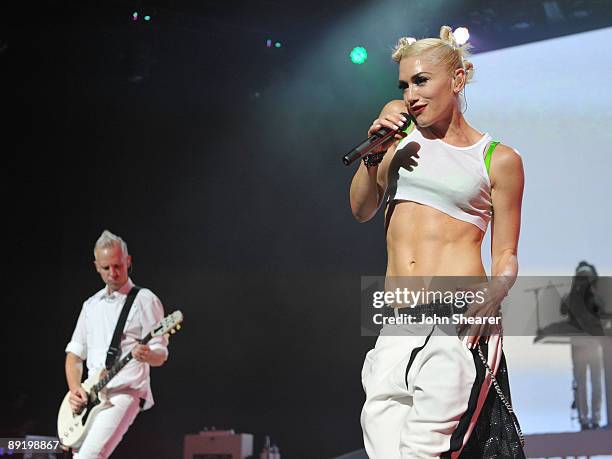 Guitarist Tom Dumont and singer Gwen Stefani of No Doubt perform at the Gibson Amphitheatre on July 22, 2009 in Universal City, California.