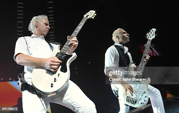 Guitarist Tom Dumont and bassist Tony Kanal of No Doubt perform at the Gibson Amphitheatre on July 22, 2009 in Universal City, California.