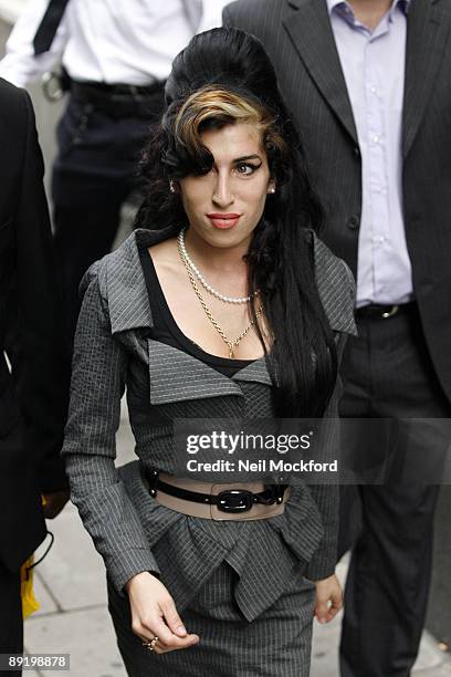 Amy Winehouse attends court to face assault charges at Westminster Magistrates Court on July 23, 2009 in London, England. It is claimed that the...