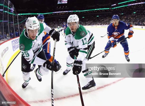 Brett Ritchie and Mattias Janmark of the Dallas Stars skates against the New York Islanders during the third period at the Barclays Center on...