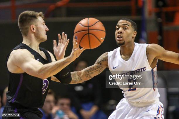 Guard Lexus Williams of the Boise State Broncos applies defensive pressure to guard Joshua Braun of the Grand Canyon Lopes during first half action...