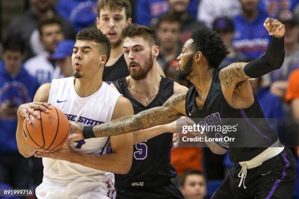 Guard Shaq Carr of the Grand Canyon Lopes slaps the ball away from guard Alex Hobbs of the Boise State Broncos during first half action on December...