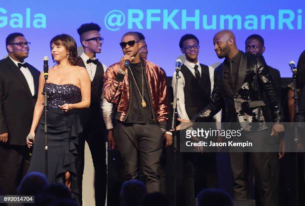 Gloria Reuben and Usher perform onstage during Robert F. Kennedy Human Rights Hosts Annual Ripple Of Hope Awards Dinner on December 13, 2017 in New...