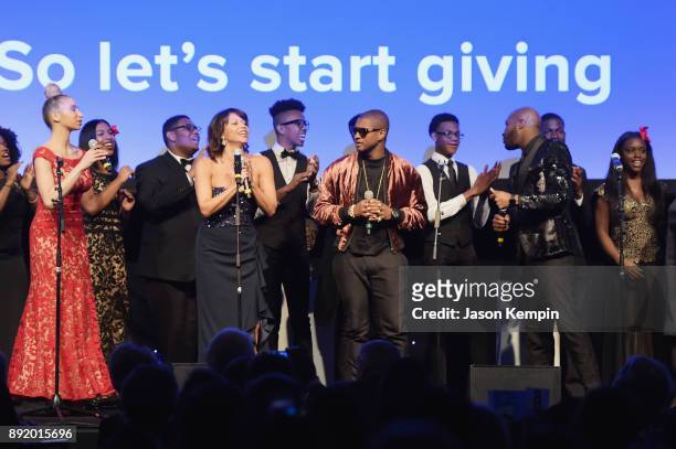 Gloria Reuben, Usher and Alfre Woodard perform onstage during Robert F. Kennedy Human Rights Hosts Annual Ripple Of Hope Awards Dinner on December...