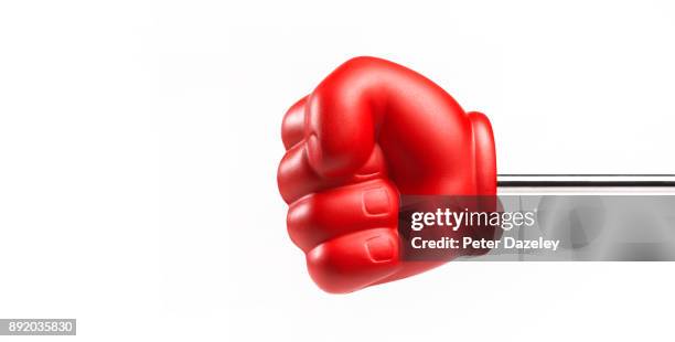 boxing glove on a stick on black - red glove stock pictures, royalty-free photos & images