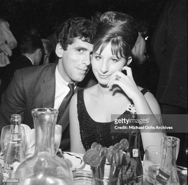 American actress and singer Barbra Streisand with her husband, actor Elliott Gould, attend an event in Los Angeles, circa 1967.