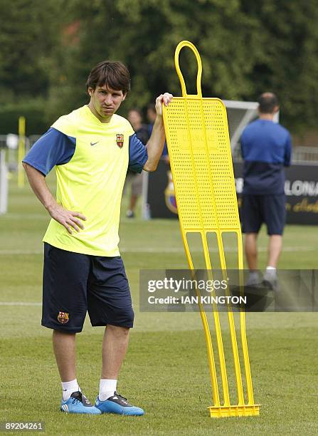 Barcelona's Argentinian player Lionel Messi is pictured during a team training session at Bisham Abbey Sports Centre in Marlow, in southern England,...