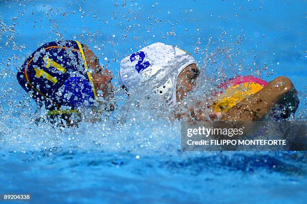 Spanish Maica Garcia fights with Brazilian Cecilia Canetti during the water-polo group D game Brazil vs. Spain on July 23, 2009 at the FINA World...