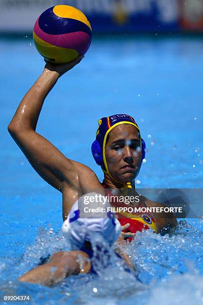 Spanish Laura Lopez tries to score despite Brazilian Cecilia Canetti during the water-polo group D game Brazil vs. Spain on July 23, 2009 at the FINA...