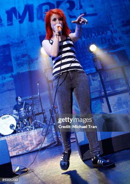Singer Hayley Williams and drummer Zac Farro of Paramore perform onstage at the Gibson Amphitheatre on July 22, 2009 in Universal City, California.