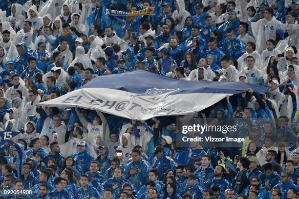 Fans of Millonarios cheer for their team during the first leg match between Millonarios and Santa Fe as part of the Liga Aguila II 2017 Final at...