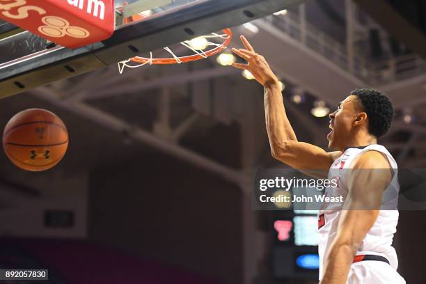 Zhaire Smith of the Texas Tech Red Raiders reacts while dunking the basketball during the game against the Kennesaw State Owls on December 13, 2017...