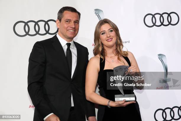 Michael Mronz and Gina-Maria Schumacher, daughter of of Michael Schumacher with award during the Audi Generation Award 2017 at Hotel Bayerischer Hof...