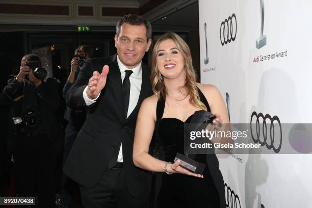 Michael Mronz and Gina-Maria Schumacher, daughter of of Michael Schumacher with award during the Audi Generation Award 2017 at Hotel Bayerischer Hof...