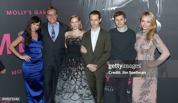 Molly Bloom, writer/director Aaron Sorkin, actors Jessica Chastain, Jeremy Strong, Michael Cera and Madison McKinley attend the "Molly's Game" New...