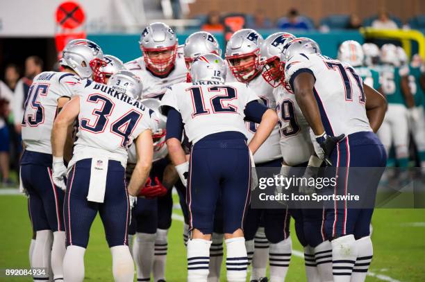 New England Patriots Quarterback Tom Brady calls a play in the huddle with New England Patriots Wide Receiver Chris Hogan , New England Patriots...