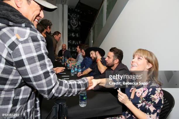 The Dustbowl Revival signs for fans at Spotlight: The Dustbowl Revival at The GRAMMY Museum on December 13, 2017 in Los Angeles, California.