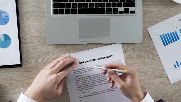 https://media.gettyimages.com/id/892088624/video/applicant-reading-terms-and-conditions-of-employment-contract-putting-signature.jpg?b=1&s=640x640&k=20&c=LopHi-2dA2ymLS_N8dt04owfKB6omfSbwB5U9Y6UB-I=