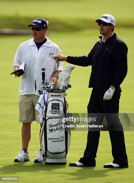 Hunter Mahan pulls a club during the first round of the Memorial Tournament at the Muirfield Village Golf Club on June 4, 2009 in Dublin, Ohio.