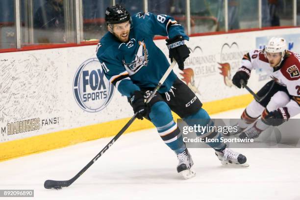 San Jose Barracuda defenseman Jeremy Roy controls the puck during a hockey game between the San Jose Barracuda and Tuscon Roadrunners on December 12...