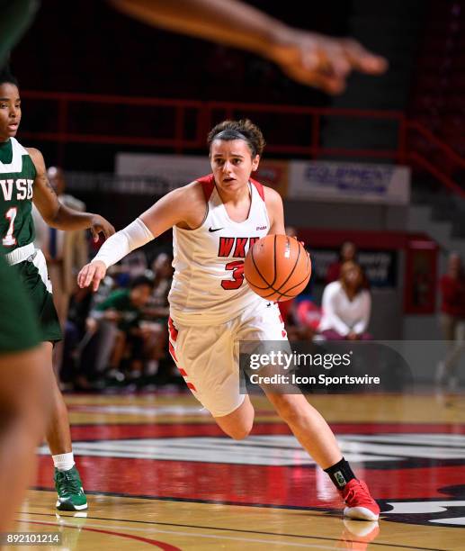 Hilltoppers guard Sidnee Bopp dribbles the ball during the first quarter between Mississippi Valley State Devilettes and the WKU Lady Toppers on...