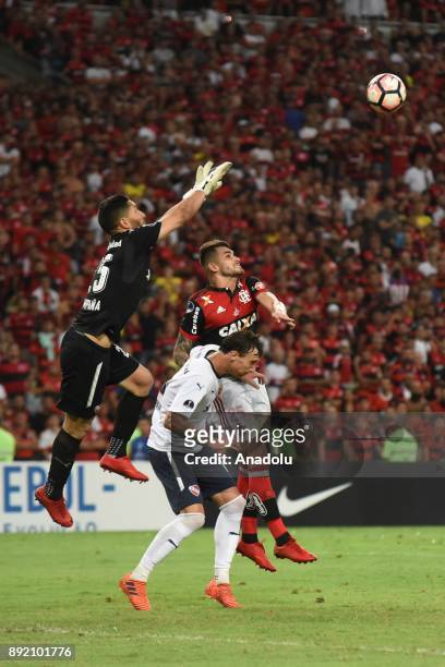 Goal keeper Campana of Independiente in action against Felipe Vizeu of Flamengo during the 2017 Sudamericana Cup championship final match between...