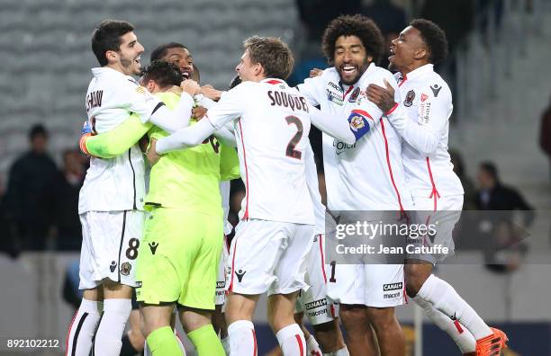 Goalkeeper of OGC Nice Yoan Cardinale celebrates the victory with Pierre Lees-Melou, Arnaud Souquet, Bonfim Dante, Wylan Ciprien and teammates...