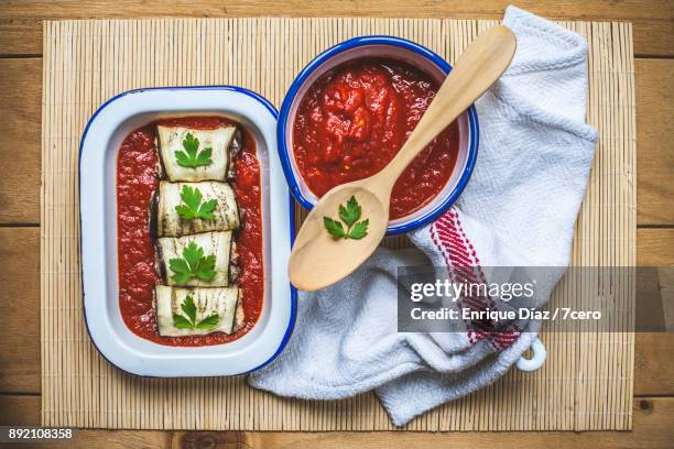 eggplant cannellonis with tomato sauce - enamel texture stock pictures, royalty-free photos & images