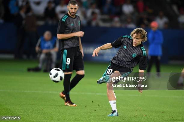 Luka Modric of Real Madrid warms up prior to the FIFA Club World Cup UAE 2017 semi-final match between Al Jazira and Real Madrid on December 13, 2017...