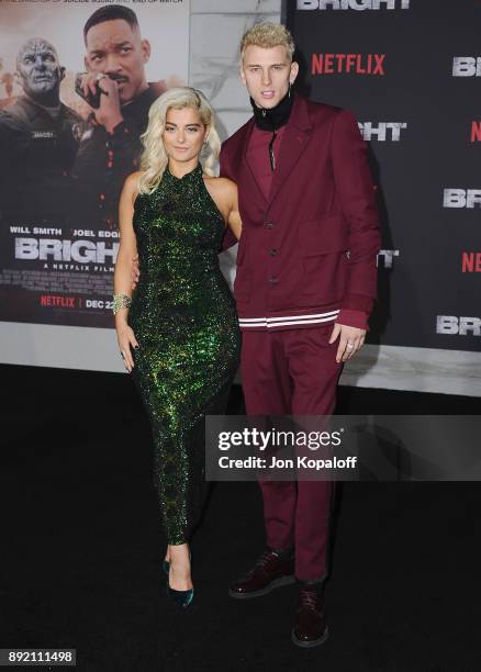 Singer Bebe Rexha and Machine Gun Kelly attend the premiere of Netflix's "Bright" at Regency Village Theatre on December 13, 2017 in Westwood,...