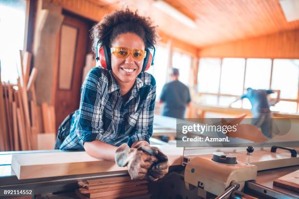 working in carpentry - carpenter stock pictures, royalty-free photos & images