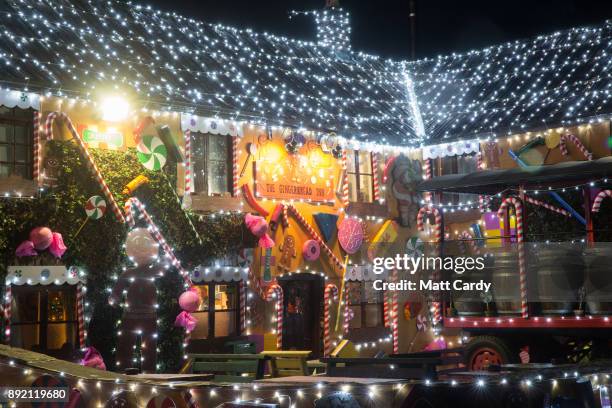 Lights illuminate the Queen Victoria Inn in the village of Priddy that has been transformed into a giant gingerbread house in time for Christmas,...