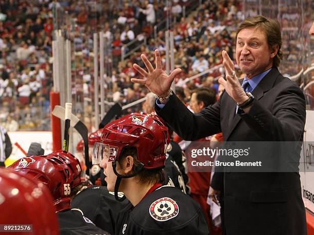 Head Coach Wayne Gretzky of the Phoenix Coyotes manages his team from behind the bench during his game against the St. Louis Blues on February 28,...