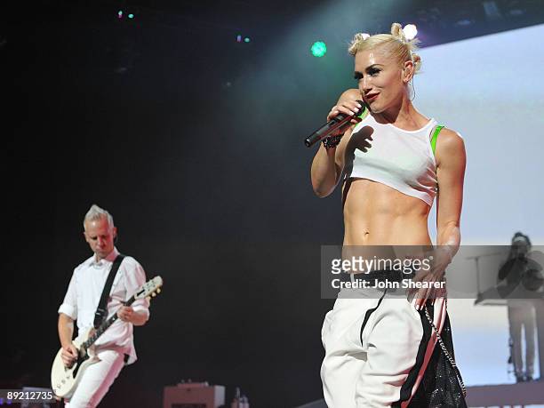 Guitarist Tom Dumont and singer Gwen Stefani of No Doubt perform at the Gibson Amphitheatre on July 22, 2009 in Universal City, California.