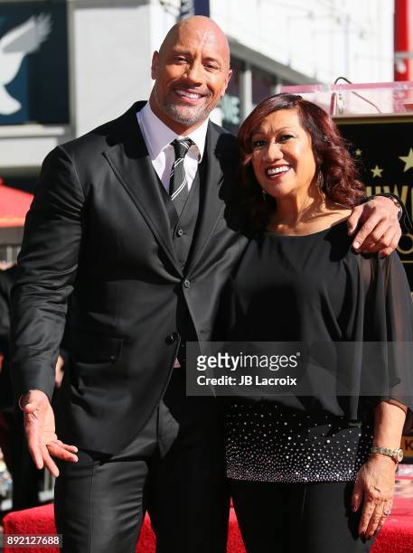 Dwayne Johnson and Ata Johnson attend a ceremony honoring him with a star on The Hollywood Walk of Fame on December 13, 2017 in Los Angeles,...
