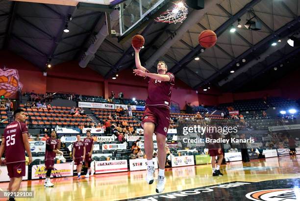 Daniel Kickert of the Bullets takes a shot at basket during the round 10 NBL match between the Cairns Taipans and the Brisbane Bullets at Cairns...