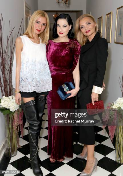 Dita Von Teese , Olgana Paris Designer Olga Djanguirov , and Ines Djanguirov attend the Olgana Paris cocktail party at the Chateau Marmont on...