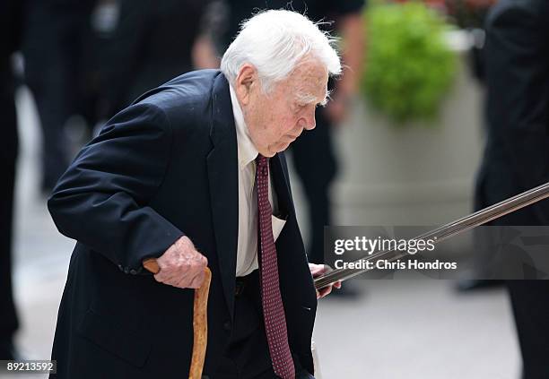 Andy Rooney, a longtime CBS newsman and commentator, walks up the church steps to attend legendary newsman Walter Cronkite's funeral service July 23,...