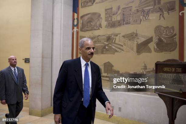 Attorney General Eric Holder in his office getting a briefing from his staff at the United States Justice Department on June 15, 2009 in Washington,...