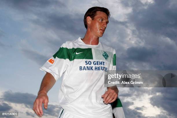 Tim Borowski of Bremen warms up before the pre season friendly match between FSV Frankfurt and Werder Bremen on July 23, 2009 in Frankfurt am Main,...