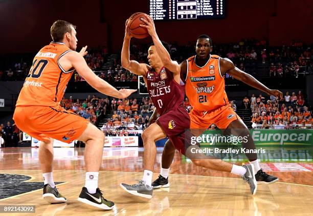 Travis Trice of the Bullets drives to the basket during the round 10 NBL match between the Cairns Taipans and the Brisbane Bullets at Cairns...