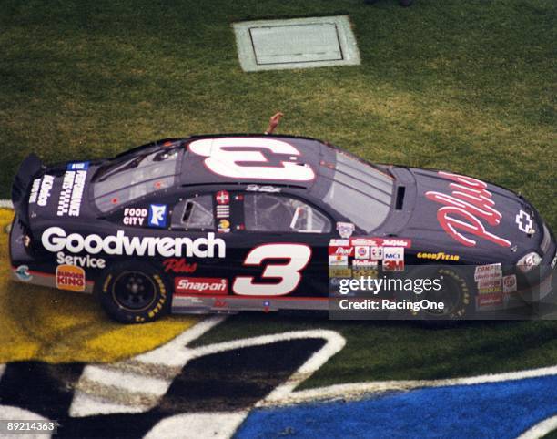 Dale Earnhardt celebrates after winning the Daytona 500.