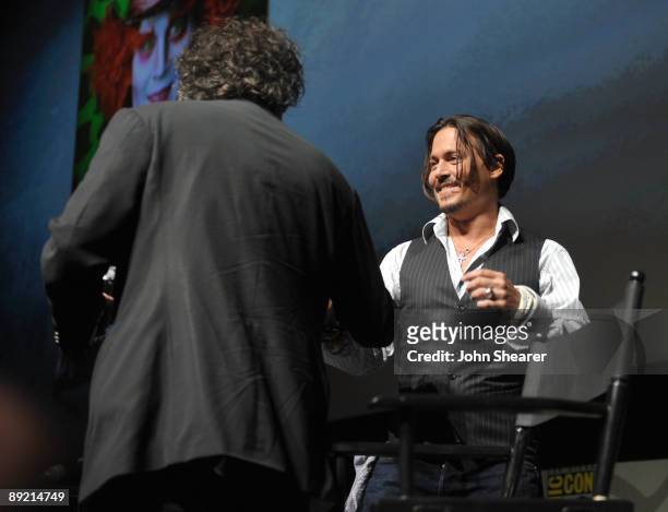 Director Tim Burton and actor Johnny Depp speak at "Alice in Wonderland" press conference during Comic-Con 2009 held at San Diego Convention Center...